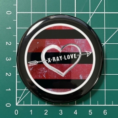 X-Ray Love Motiv 1 Anstecker mit Sicherheitsnadel Ø 25 mm